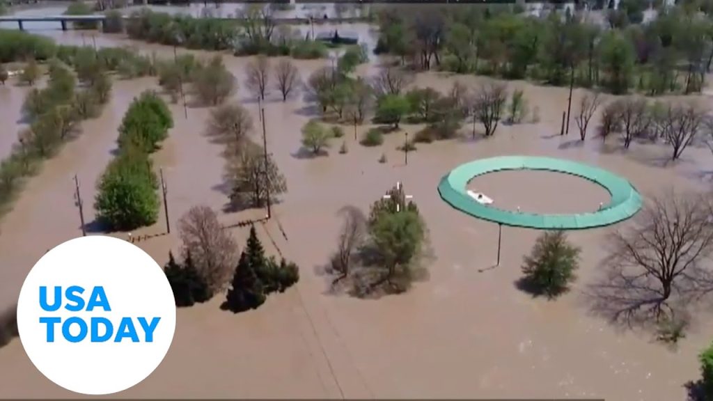 Aerial drone shows massive flooding in Michigan | USA TODAY